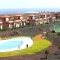 Con campo di paddle, tennis e pisicna comune