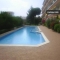 Con piscina comune e giardino
